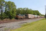 CSX 3437 takes a train west